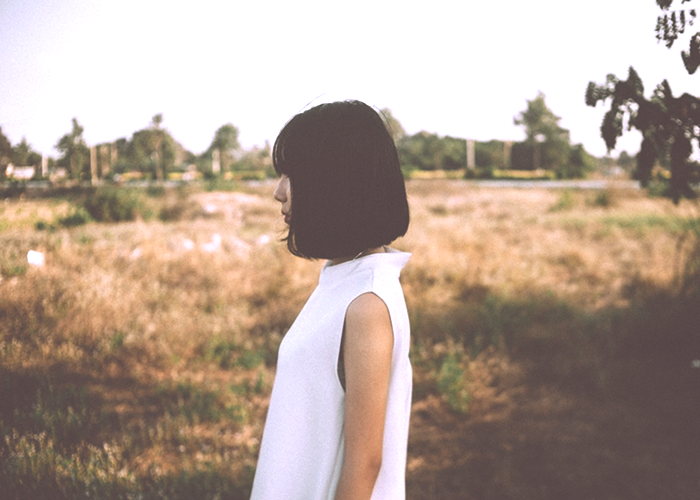 girl-standing-in-field