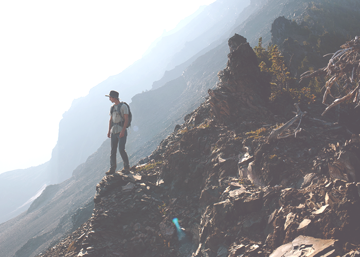 guy-standing-on-cliff