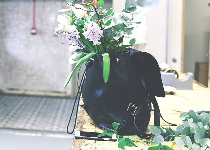 tfd_black-leather-bag-flowers-and-phone