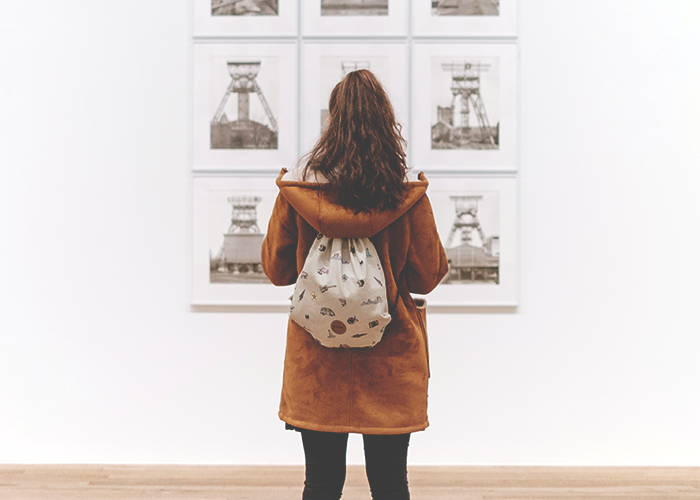 tfd_woman-in-museum-looking-at-art