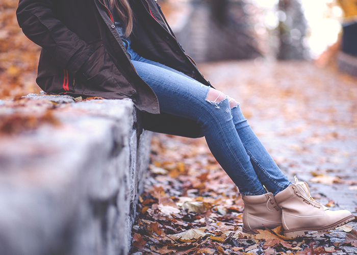 tfd_young-girl-sitting-on-wall-outside