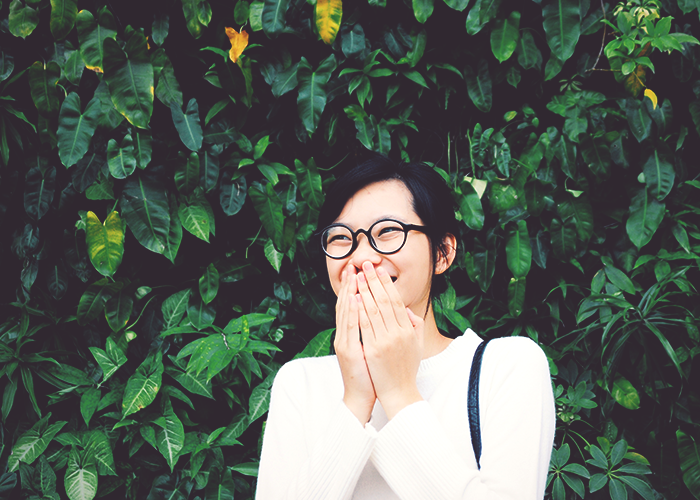 tfd_young-woman-in-glasses-smiling