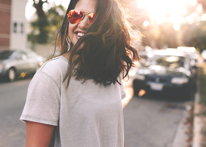 tfd_woman-laughing-in-sunglasses