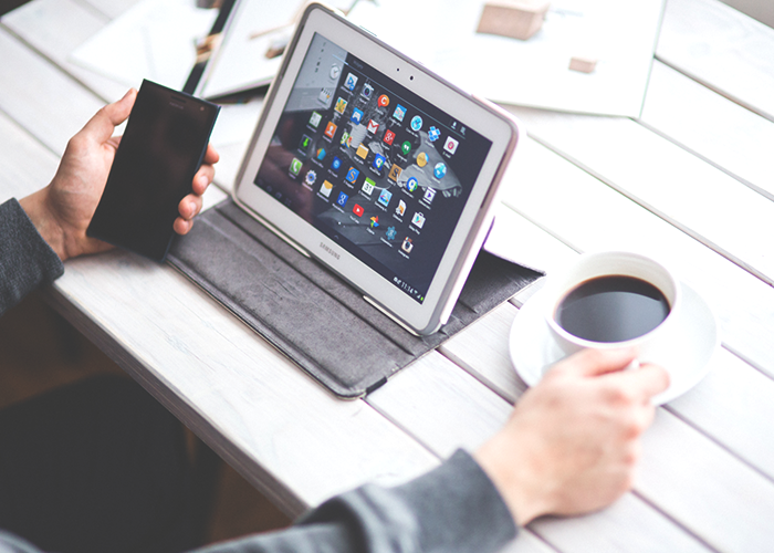 tfd_woman-working-with-ipad-and-coffee