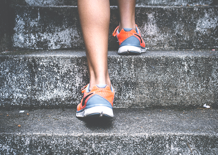 person-walking-up-stairs