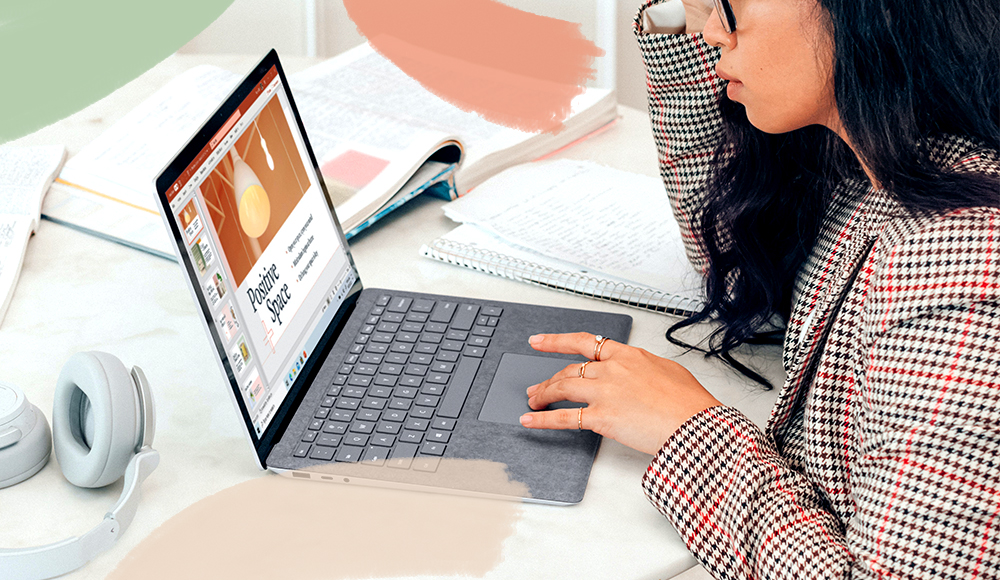 Image of girl reading on laptop