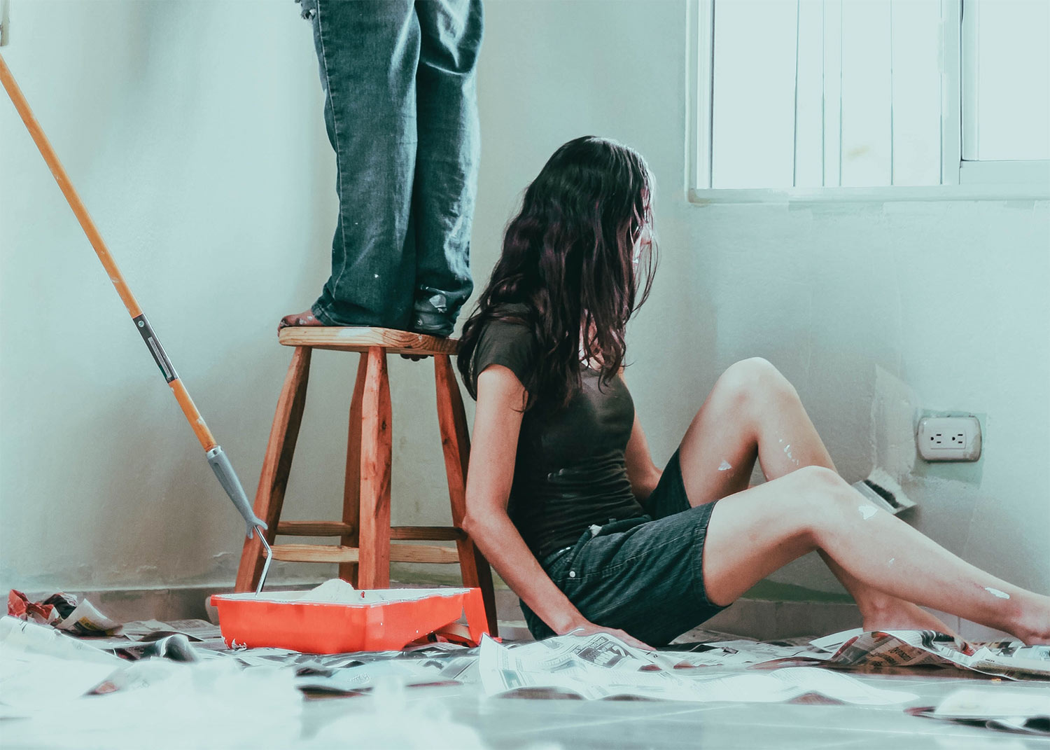 Photo of woman sitting on floor